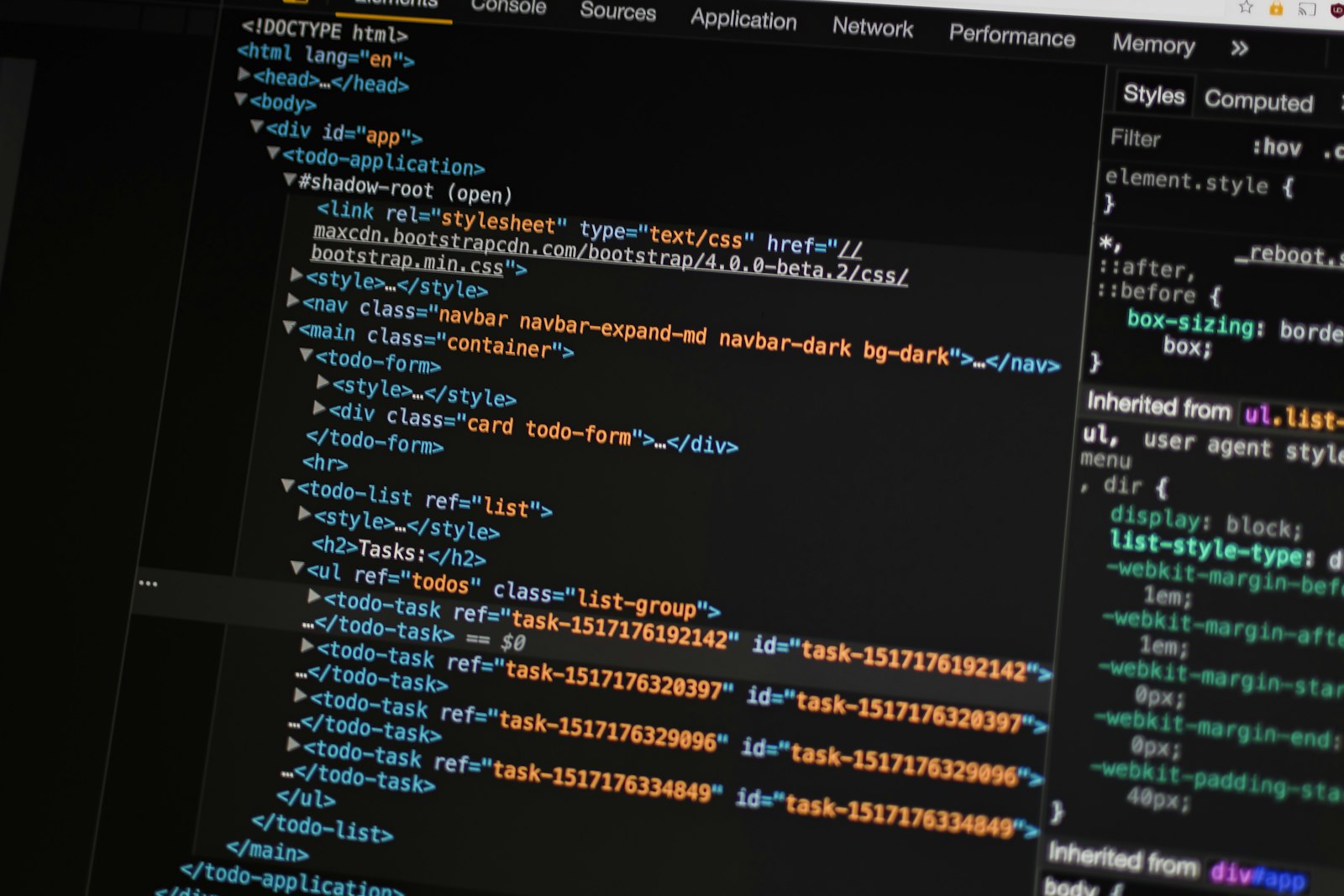 Browser developer tools open over a web application's code