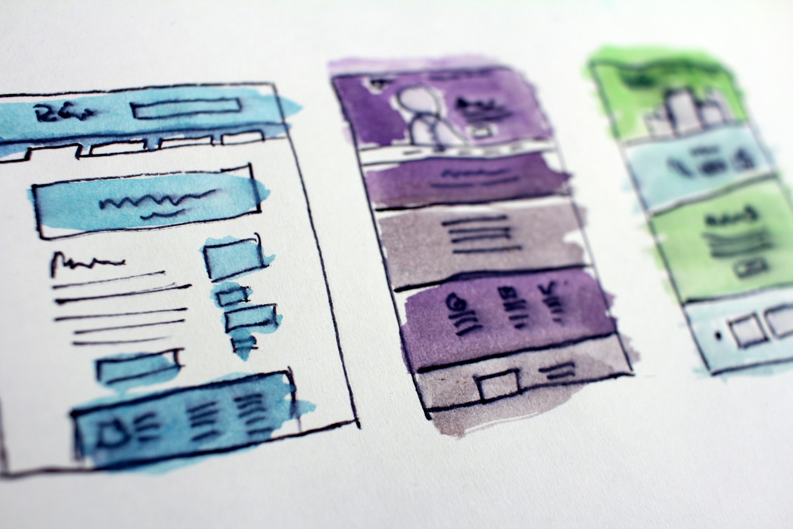 Hand-drawn website wireframe sketches